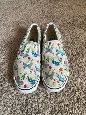 Vans Classic Slip-On Sneakers in White with Blue and Pink Butterfly Floral Print